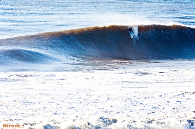 PJ Raia surfing big waves in New Jersey.