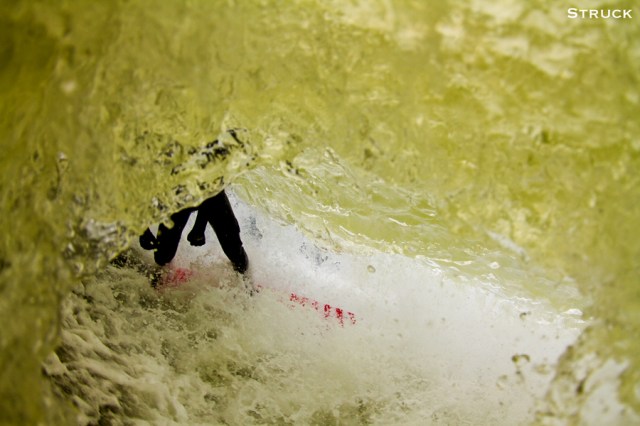 pj raia surfing in new jersey. fisheye photography. fisheye water photography. new jersey surf photographer. swimming.