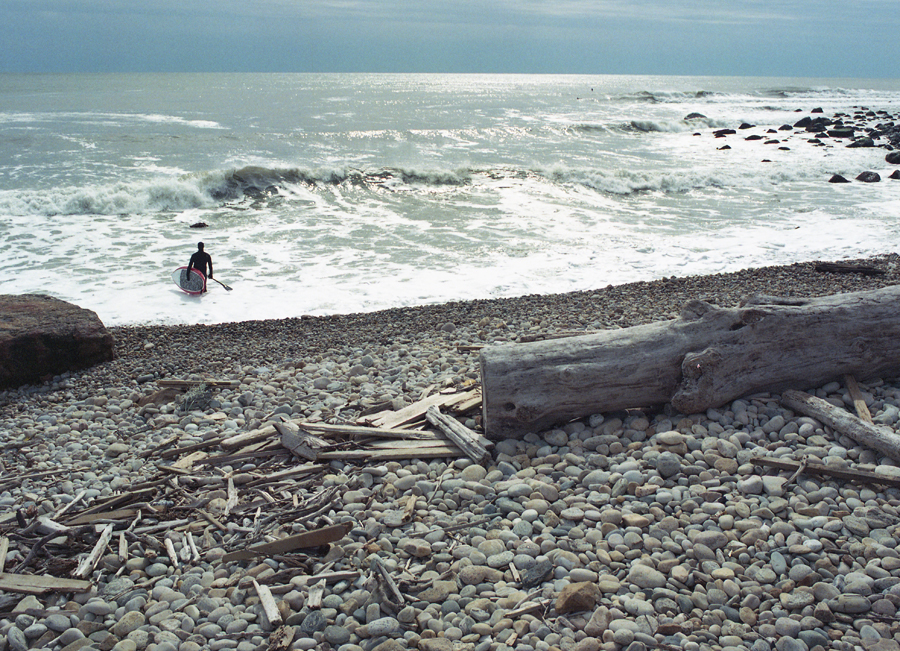 new york surf report. SUP. Stand Up Paddle. Montauk. Cobble stone beach. surf photograher. film surf photograph. medium format.