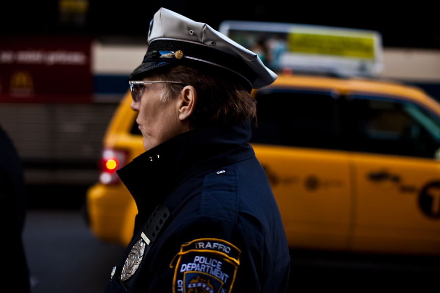 new york city. street photography. fall fashion. street advertisment. november 2013. what are people wearing. new york photographer. police. taxi cab.