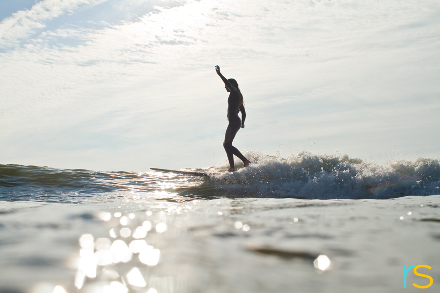 female surfer
